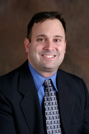Jeff Friedlander, founder of NJ Landlord Center, in the Flemington office